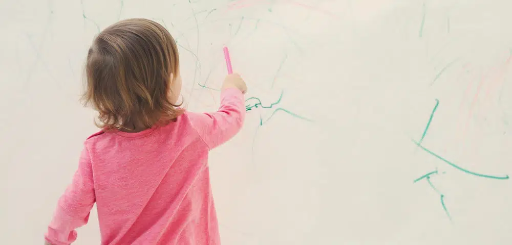 Whether you have a toddler who used the wall as a canvas or you accidentally get ink on the wall, you will want to clean it off. There are several different methods that you can use to remove ink, and one of them will work best for you. Continue reading to learn four ways to remove ink from your walls. 1. Rubbing Alcohol One of the best ways to remove ink from the walls is with rubbing alcohol. You need rubbing alcohol and a damp cloth for this process, and it is pretty effective. Start by dampening the cloth with warm water. Squeeze it out so that it isn’t dripping, and then put rubbing alcohol on one end. Use your finger under the cloth to lightly rub the area with the ink until it is removed. You can dab on the ink stain until it is gone. This process will also remove magic markers and other types of stains from the walls. 2. Baking Soda and Water Another great method for removing ink from the walls is to use baking soda and water. For this method, you need baking soda, water, a small bucket or bowl, and a cloth. Start by mixing the baking soda and water. You should have two portions of water for every one portion of baking soda. This will dilute it enough to clean the ink off the wall. It should form a paste, and you can take your damp cloth and gently rub the mixture onto the wall. Don’t rub hard because baking soda can remove the color from the area if you aren’t too careful. 3. Mixture of Ammonia, Lemon Juice, and Detergent This mixture of ammonia, lemon juice, and detergent will remove ink from the walls. Start by getting a small bucket or a bowl, and mix them together in a 1:1:2 ratio. Detergent will be two parts mixed with one part ammonia and one part lemon juice. Once you mix them, pour the ingredients into a spray bottle. You can spray it on the ink, and use a damp cloth to pat the area dry and remove the ink from the wall. This is a great solution that helps you get your wall ink-free. 4. Magic Eraser Your grocery store will carry magic erasers in the cleaning products aisle. They are made by a few different companies. They are a sponge-like product that is designed to remove ink and other stains from the walls or furniture. You can take one of these magic erasers and rub it back and forth over the stain until it is gone. Final Words Most of the time, one of these methods will help you remove ink and other stains from your walls. You can choose the one that is most convenient for you, considering the supplies that you already have on hand. Make sure that you don’t press too hard because you can damage the wall or remove the color. If you aren’t able to remove the ink, you can always repaint the wall.