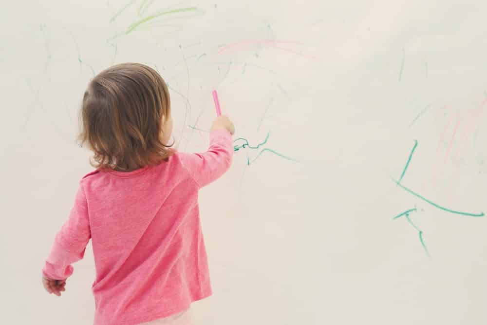 Whether you have a toddler who used the wall as a canvas or you accidentally get ink on the wall, you will want to clean it off. There are several different methods that you can use to remove ink, and one of them will work best for you. Continue reading to learn four ways to remove ink from your walls. 1. Rubbing Alcohol One of the best ways to remove ink from the walls is with rubbing alcohol. You need rubbing alcohol and a damp cloth for this process, and it is pretty effective. Start by dampening the cloth with warm water. Squeeze it out so that it isn’t dripping, and then put rubbing alcohol on one end. Use your finger under the cloth to lightly rub the area with the ink until it is removed. You can dab on the ink stain until it is gone. This process will also remove magic markers and other types of stains from the walls. 2. Baking Soda and Water Another great method for removing ink from the walls is to use baking soda and water. For this method, you need baking soda, water, a small bucket or bowl, and a cloth. Start by mixing the baking soda and water. You should have two portions of water for every one portion of baking soda. This will dilute it enough to clean the ink off the wall. It should form a paste, and you can take your damp cloth and gently rub the mixture onto the wall. Don’t rub hard because baking soda can remove the color from the area if you aren’t too careful. 3. Mixture of Ammonia, Lemon Juice, and Detergent This mixture of ammonia, lemon juice, and detergent will remove ink from the walls. Start by getting a small bucket or a bowl, and mix them together in a 1:1:2 ratio. Detergent will be two parts mixed with one part ammonia and one part lemon juice. Once you mix them, pour the ingredients into a spray bottle. You can spray it on the ink, and use a damp cloth to pat the area dry and remove the ink from the wall. This is a great solution that helps you get your wall ink-free. 4. Magic Eraser Your grocery store will carry magic erasers in the cleaning products aisle. They are made by a few different companies. They are a sponge-like product that is designed to remove ink and other stains from the walls or furniture. You can take one of these magic erasers and rub it back and forth over the stain until it is gone. Final Words Most of the time, one of these methods will help you remove ink and other stains from your walls. You can choose the one that is most convenient for you, considering the supplies that you already have on hand. Make sure that you don’t press too hard because you can damage the wall or remove the color. If you aren’t able to remove the ink, you can always repaint the wall.