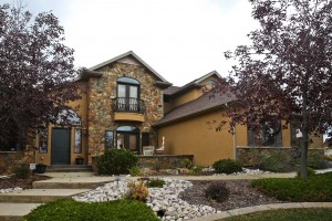 painting a stucco house exterior in Billings